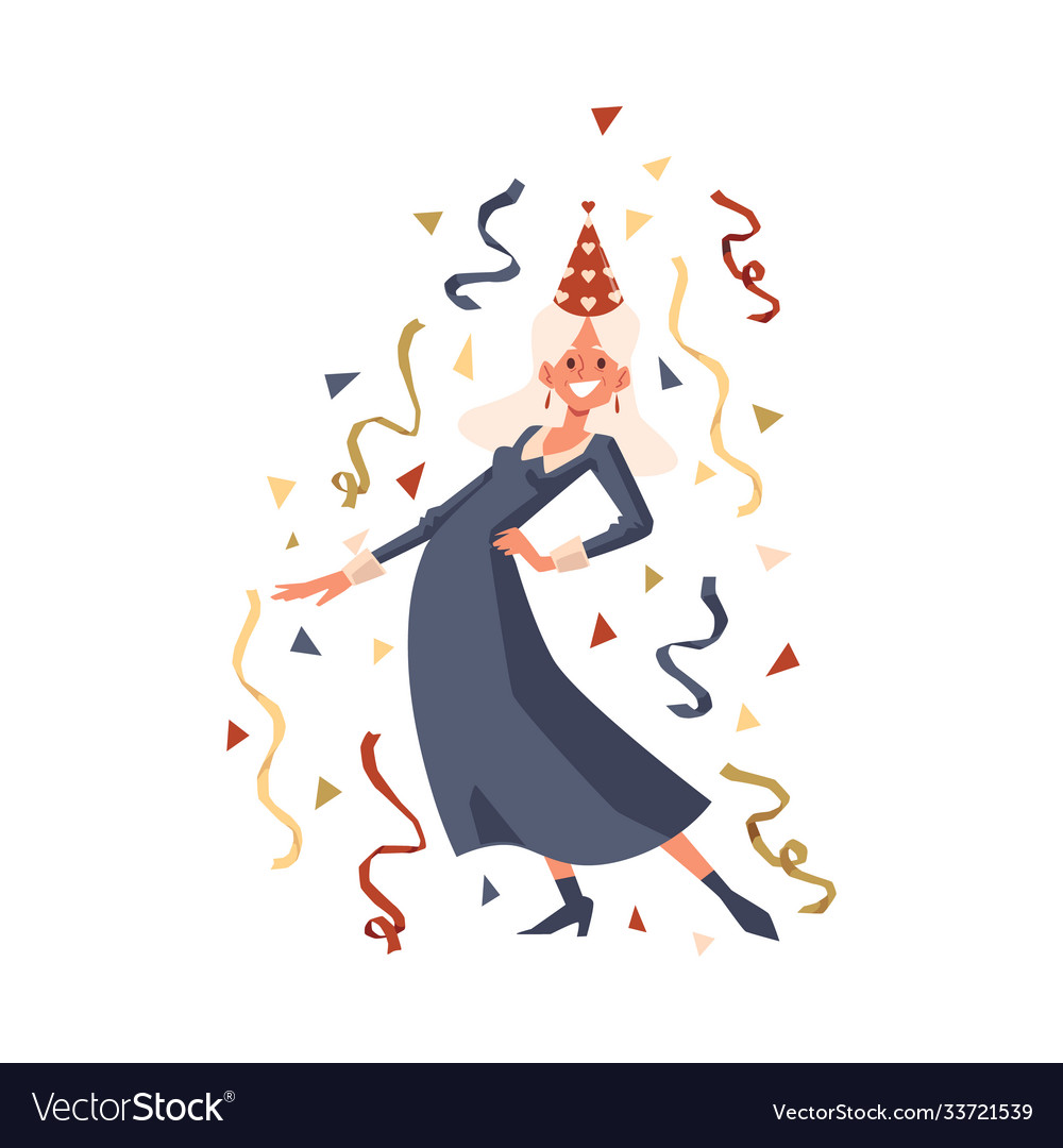 Happy old woman in party hat dancing with confetti