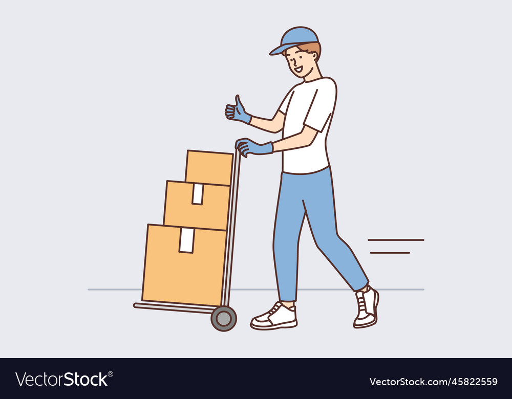 Man at warehouse worker carries cargo cart