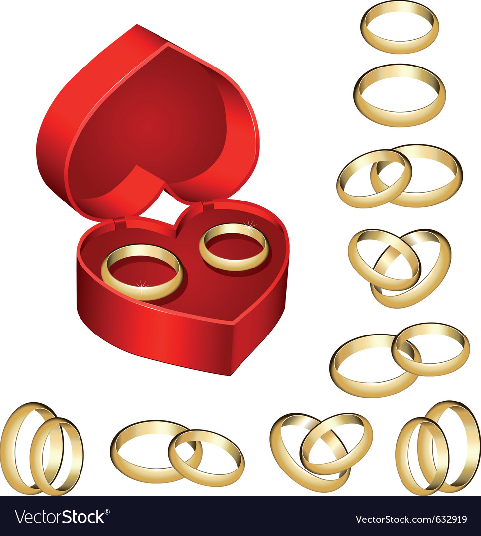 Set of gold wedding rings with heart-shaped box