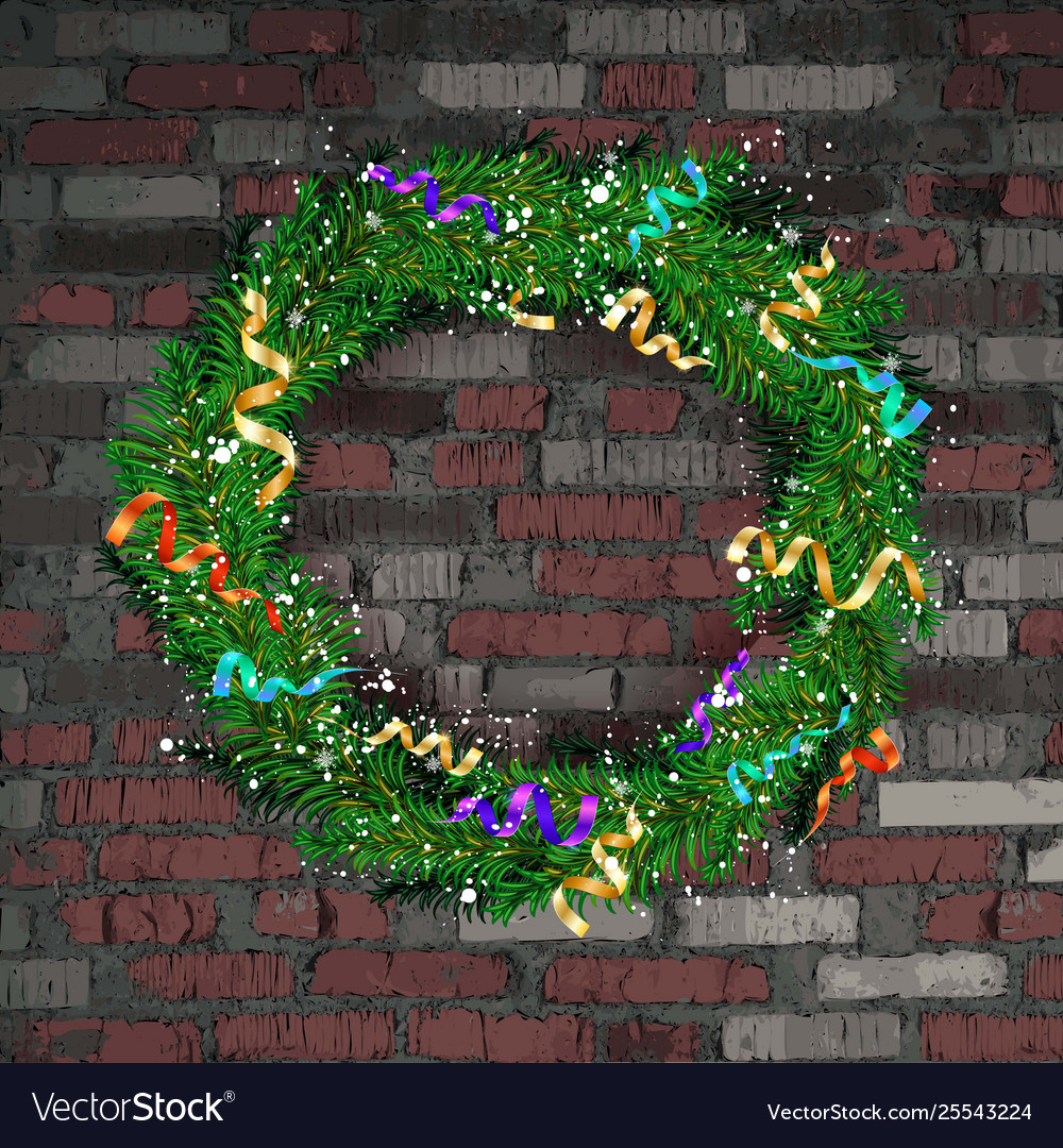 Christmas wreath on old brick wall