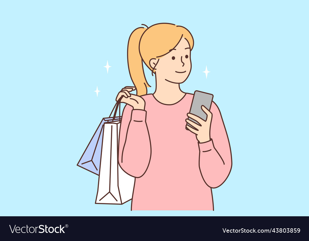 Happy woman with cellphone and shopping bags