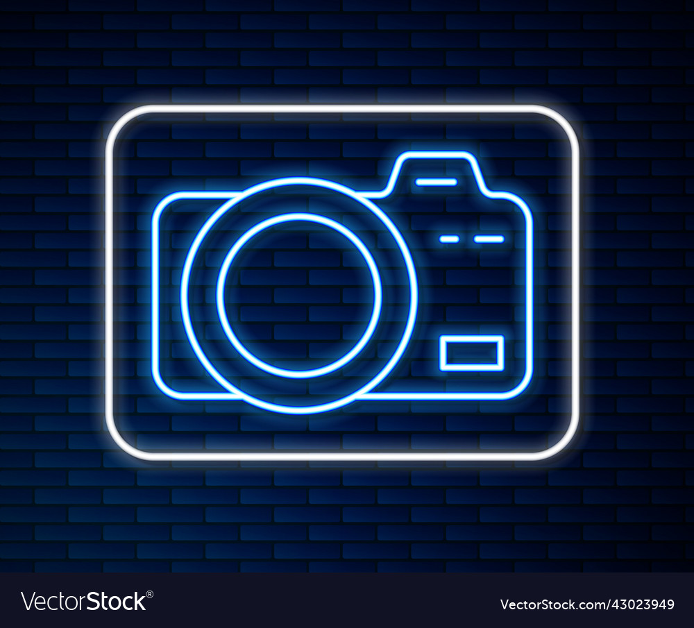 Glowing neon line photo camera icon isolated