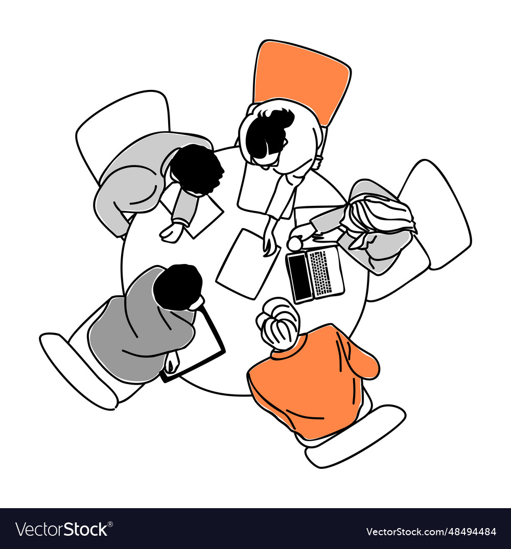 Business team members sitting at the desk top view