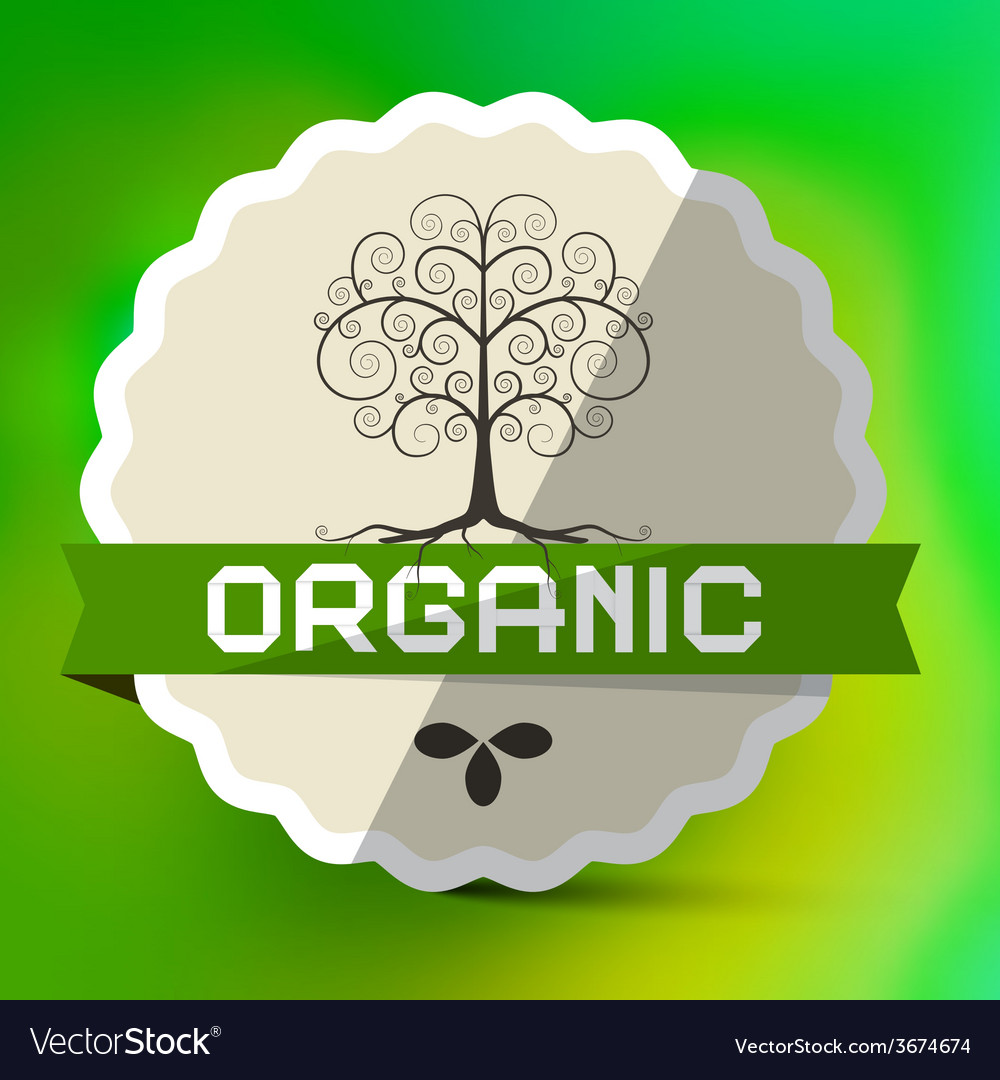 Organic label with tree sign on green blurred