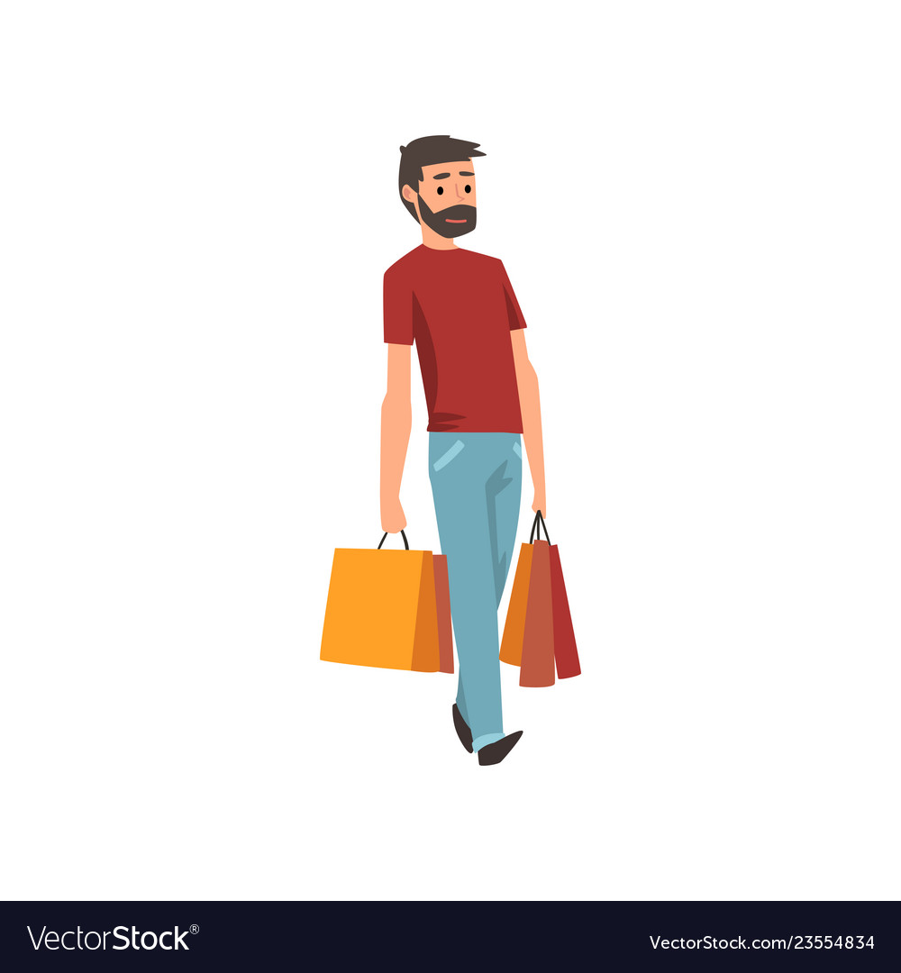 Young bearded man walking with shopping bags