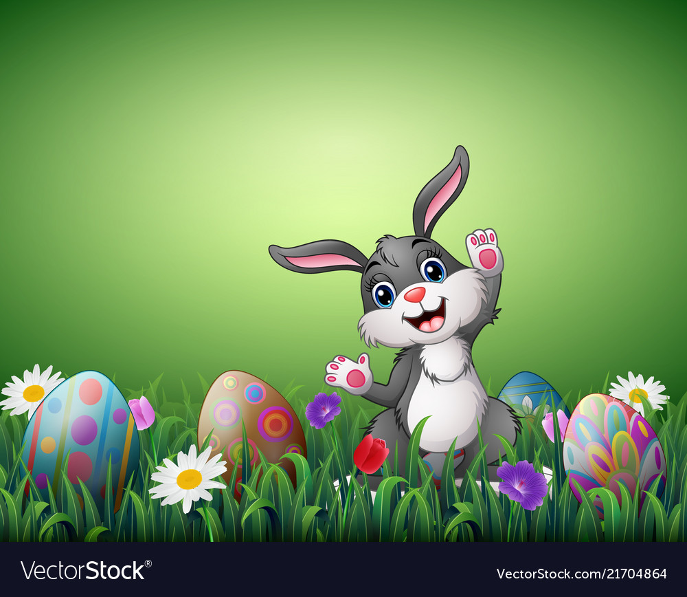 Happy easter bunny with decorated easter eggs in a