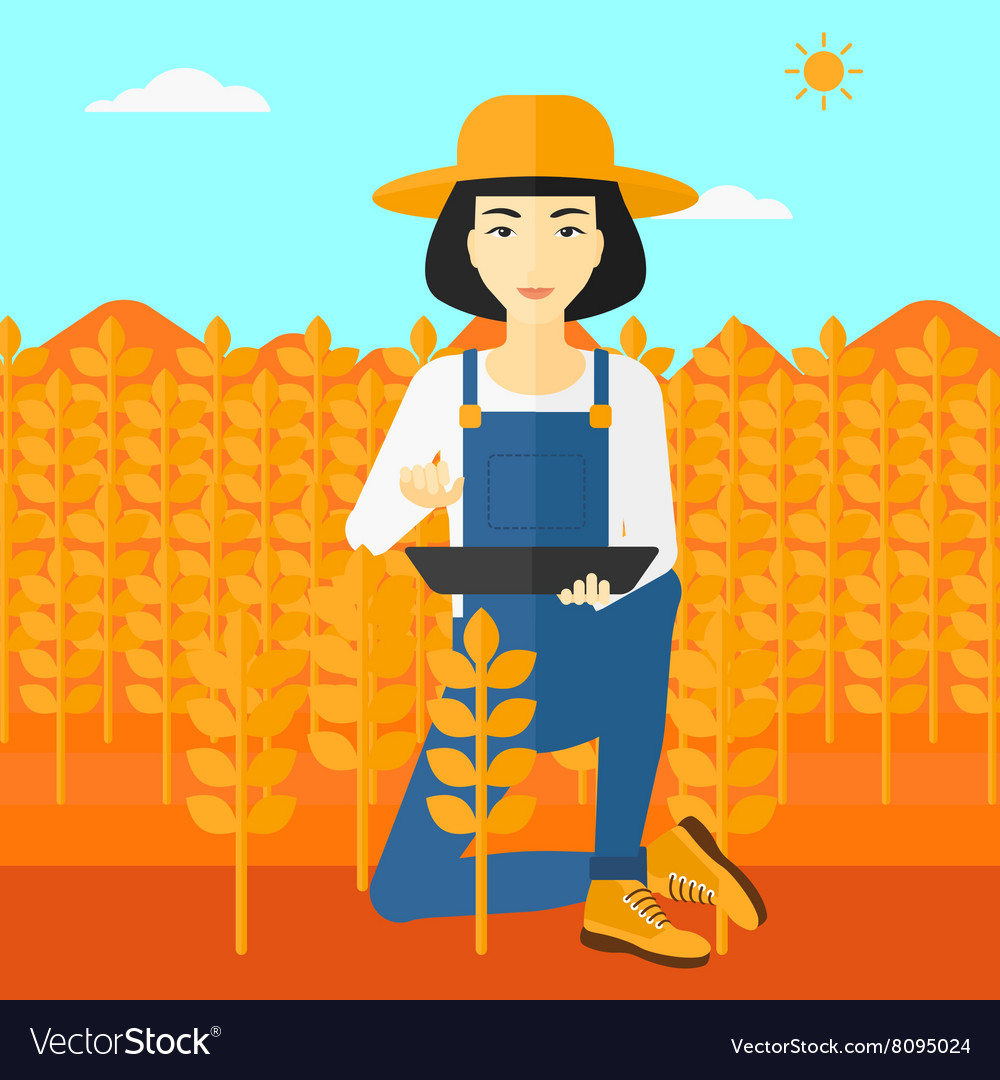 Farmer with tablet computer on field
