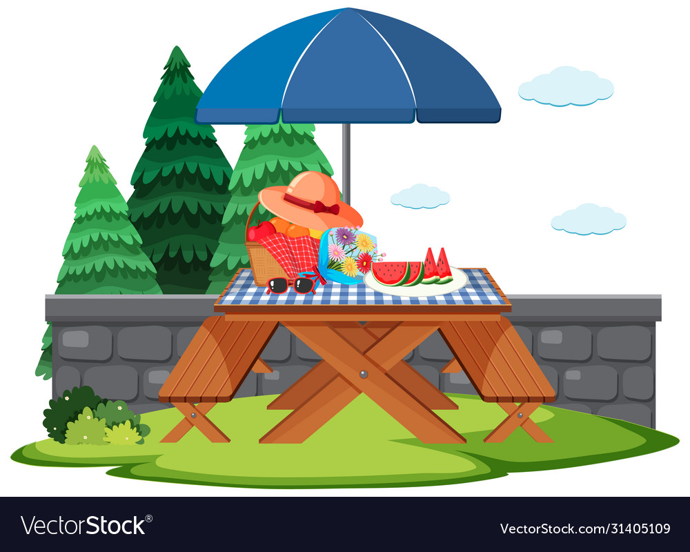 Picnic scene with food on table in garden