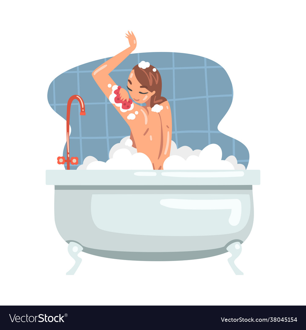 Young female bathing in bathtub washing her