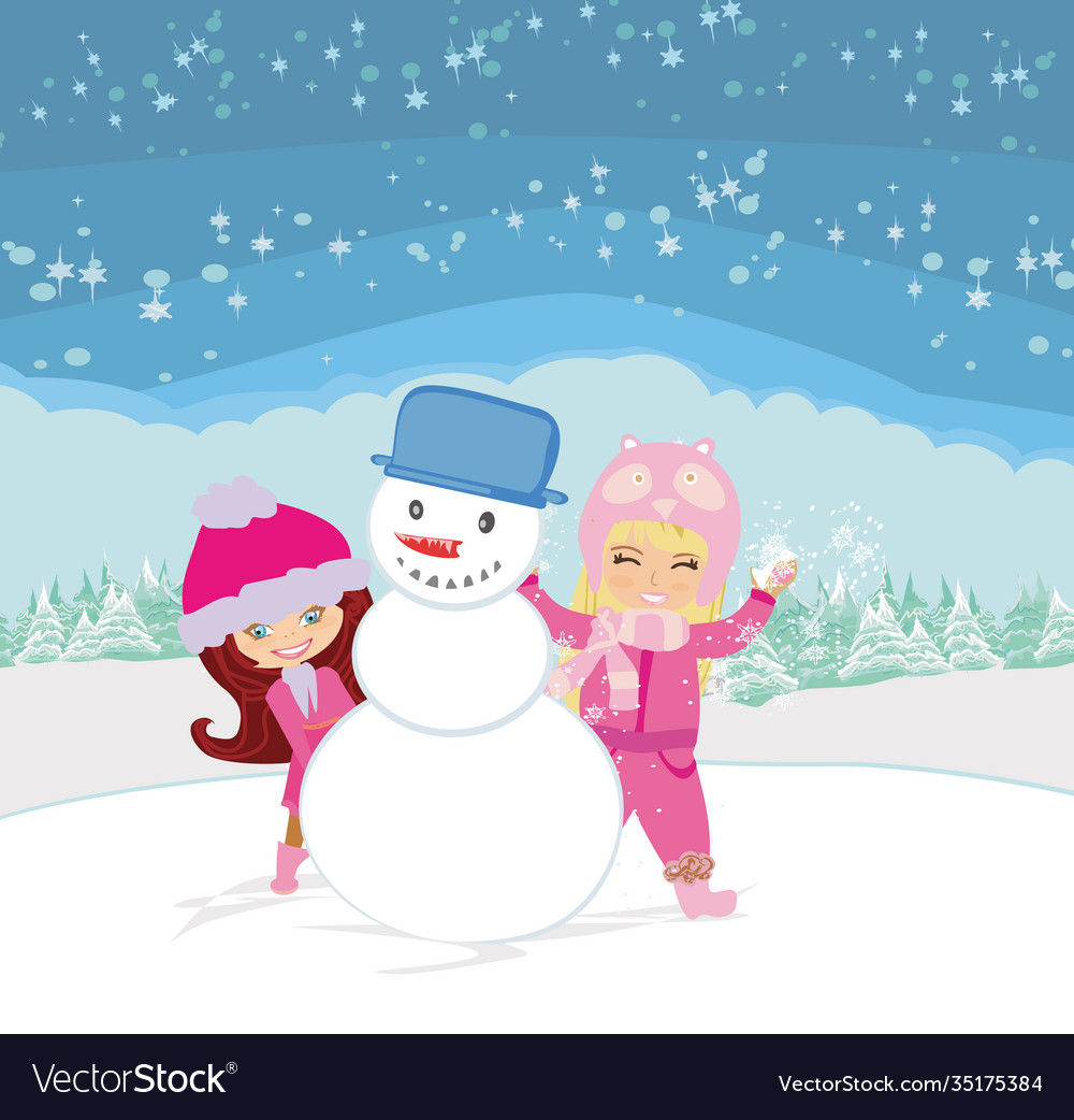 Happy girls make a snowman