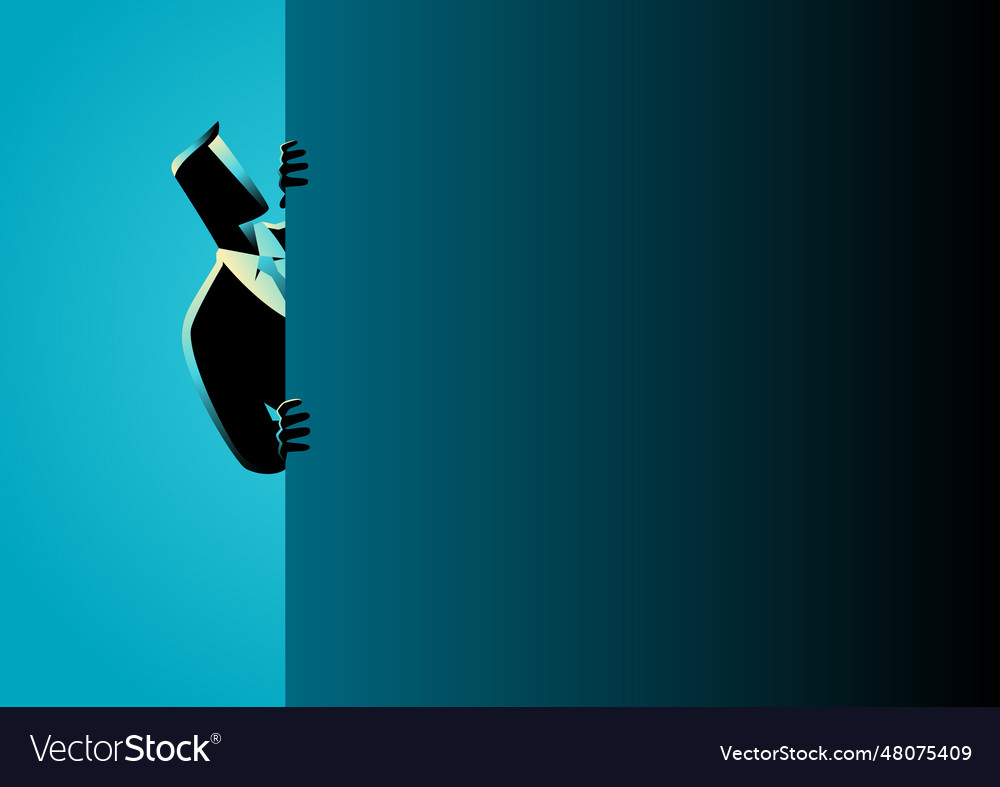 Businessman peeking from behind wall