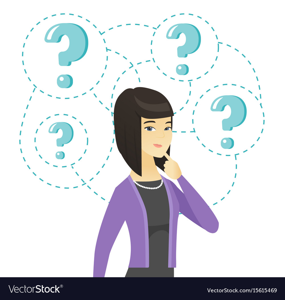 Young business woman standing under question marks