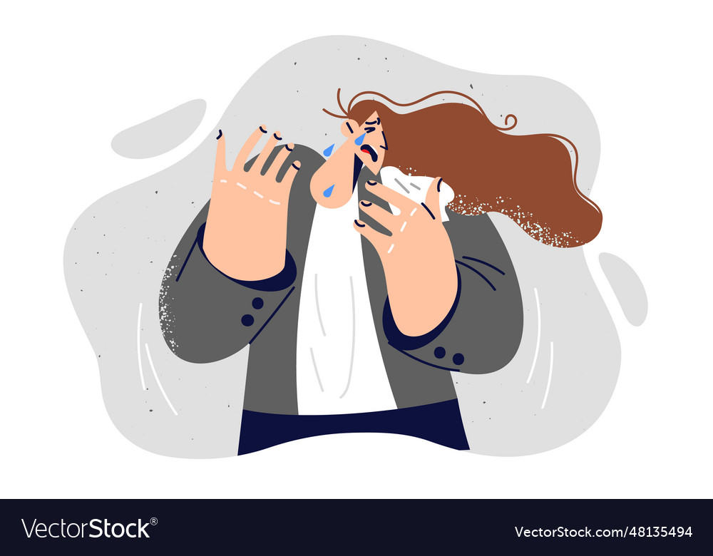 Crying woman stands with handkerchief in hand