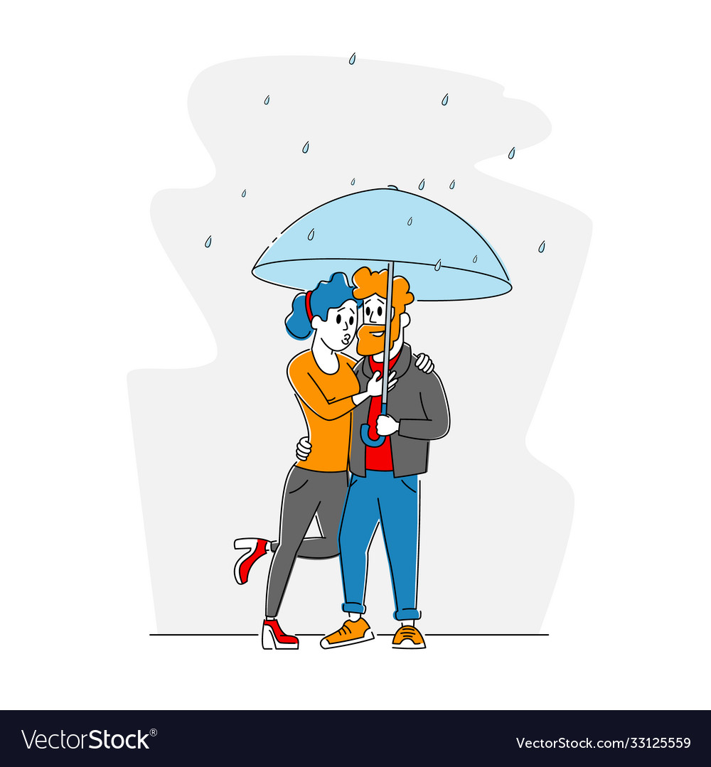 Happy loving couple hugging walking in rainy