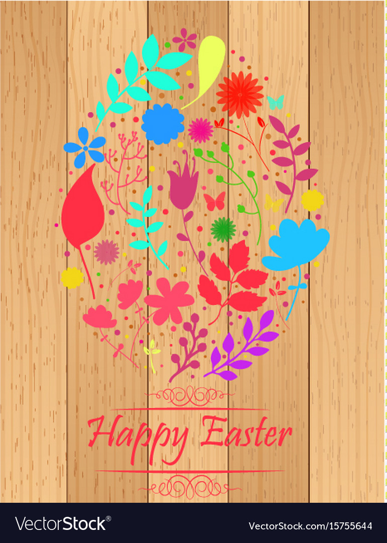 Easter egg made from flowers on wooden background