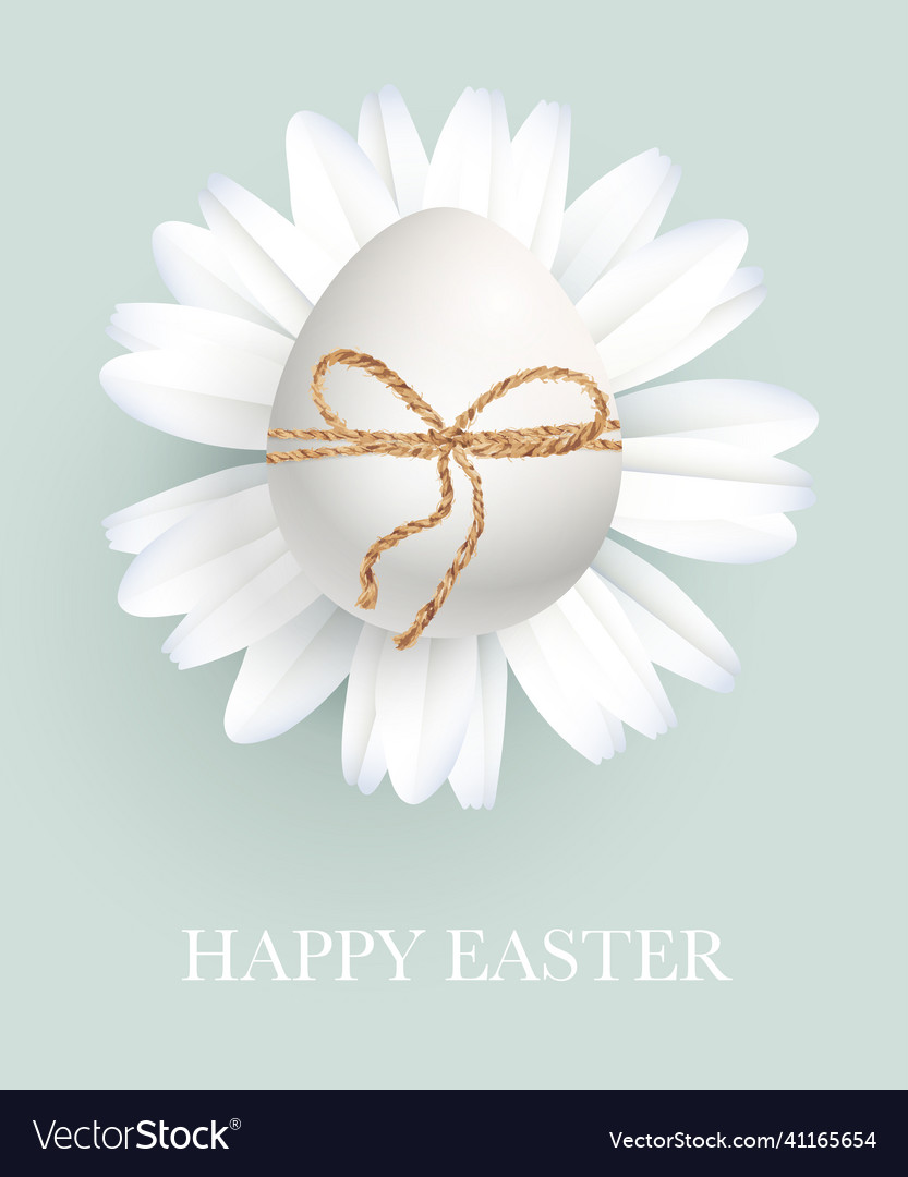 Easter white egg on a daisy tied with twine