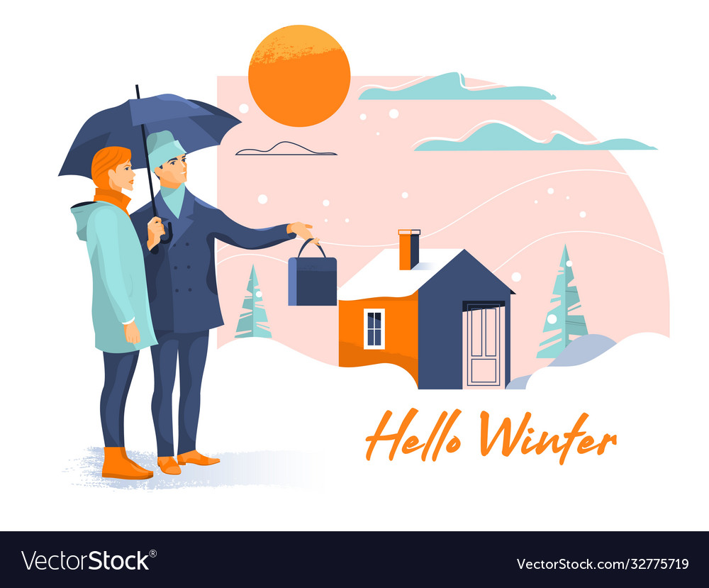 Young beautiful couple with umbrella on snowy