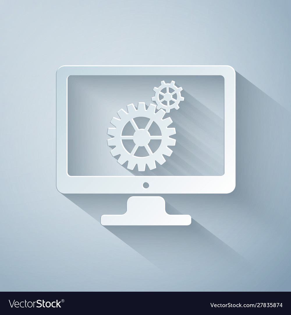 Paper cut computer monitor and gears icon on grey