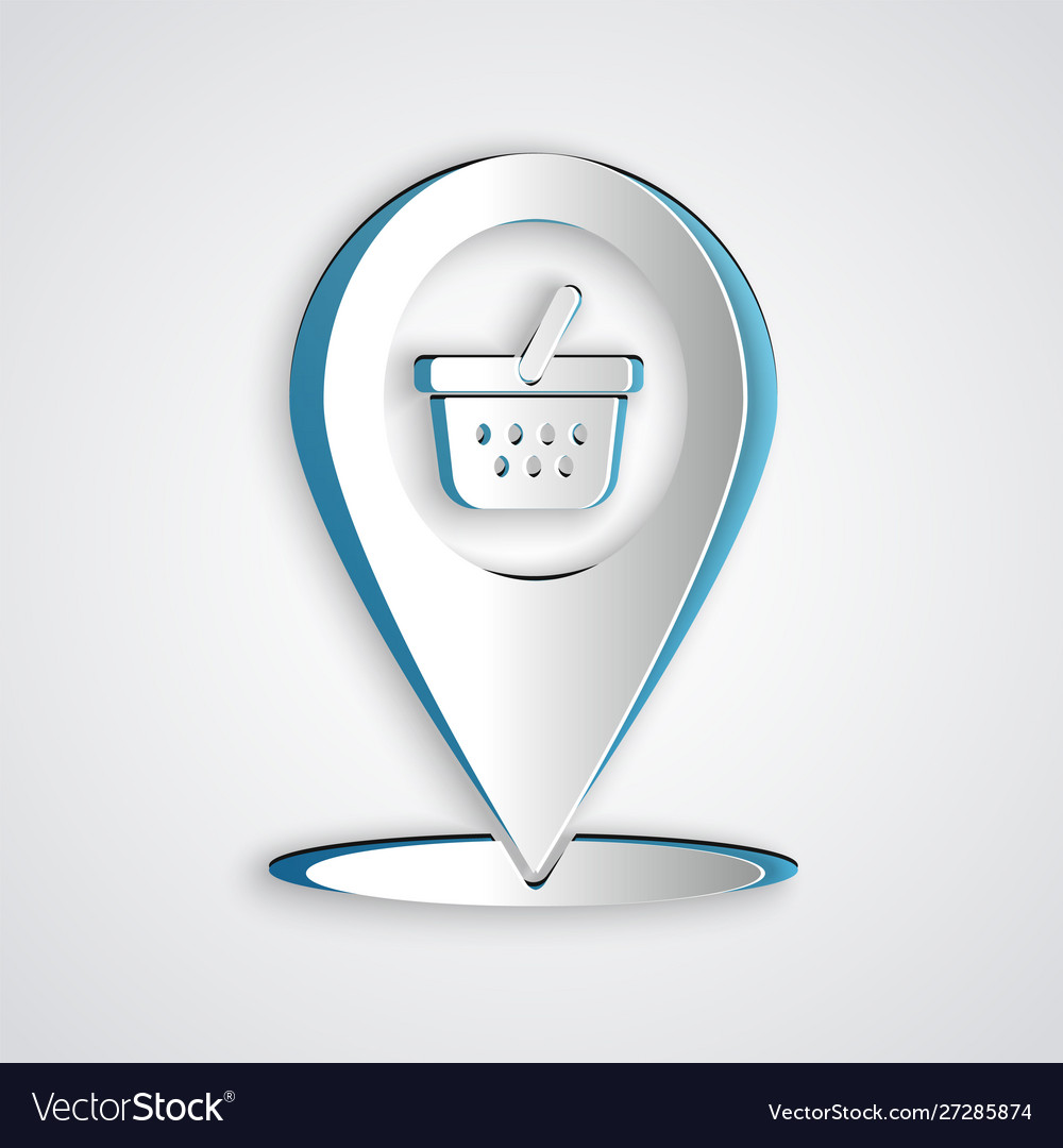 Paper cut map pointer with shopping basket icon