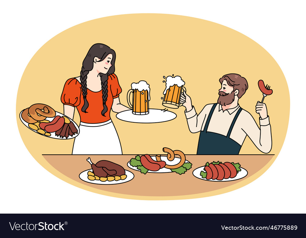 Happy man and woman celebrate oktoberfest