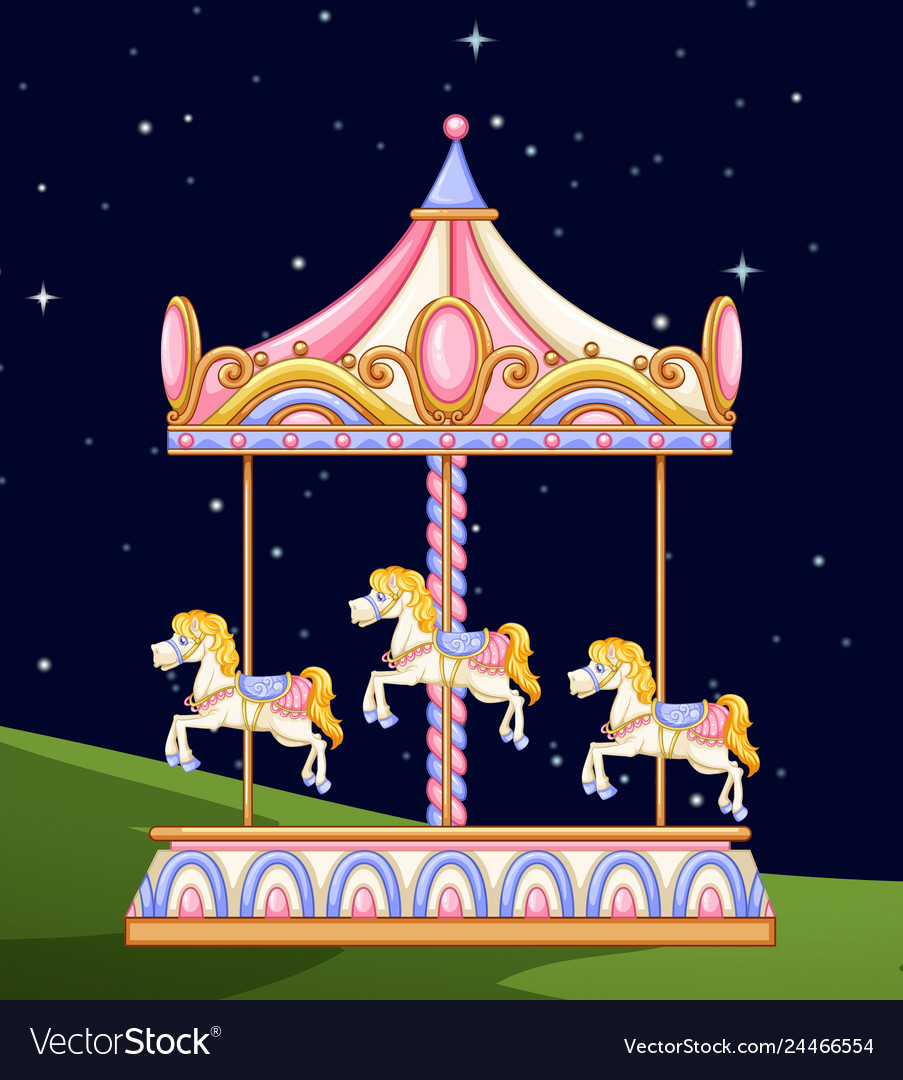 A carousel in the park at night