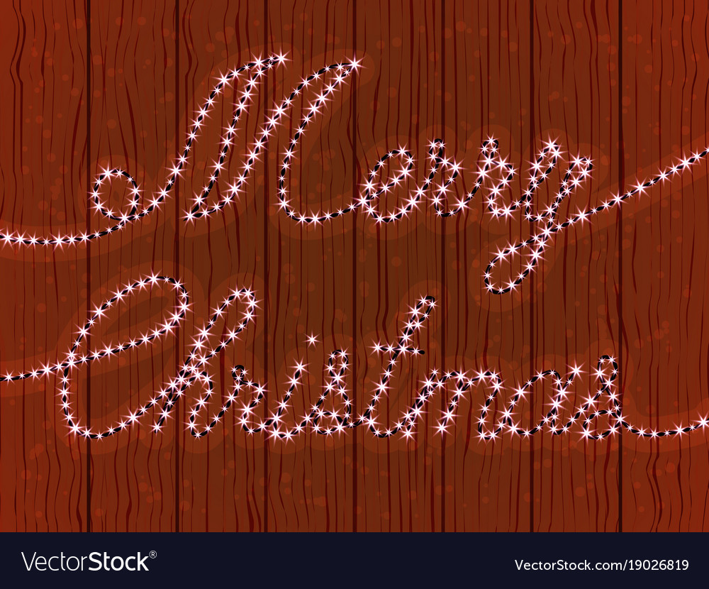 Merry christmas a wooden wall with garland