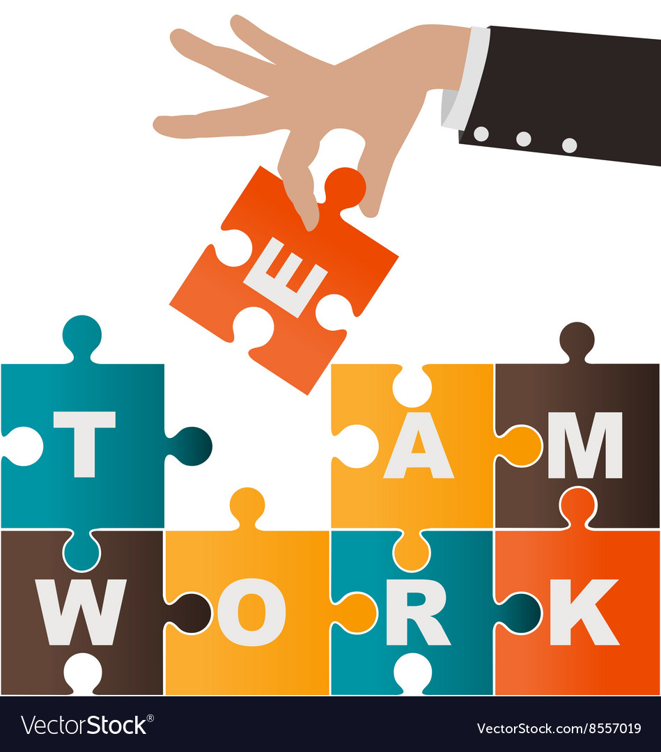 Businesswoman assembling puzzle with teamwork