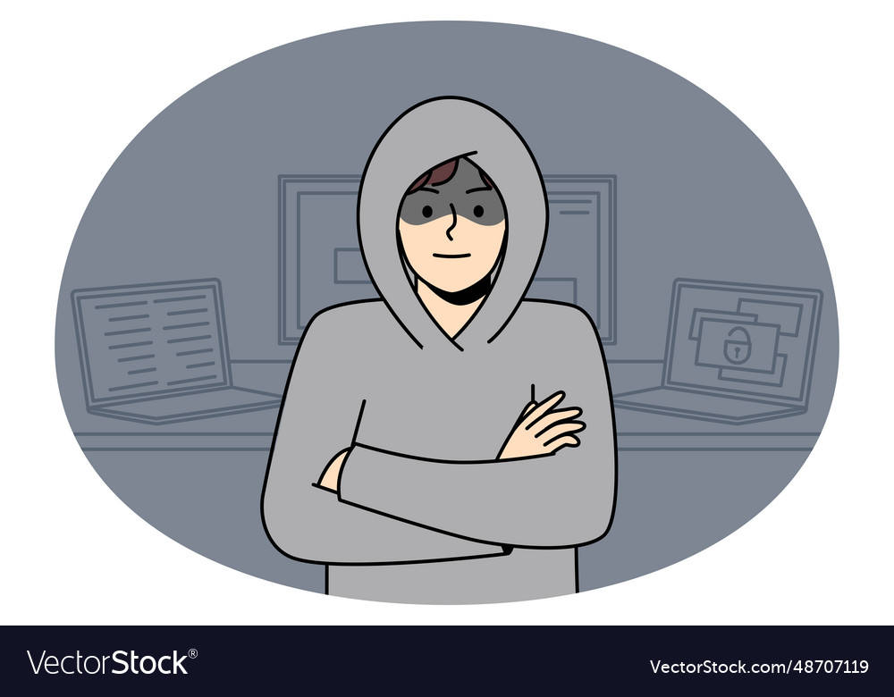 Male hacker stand near computers