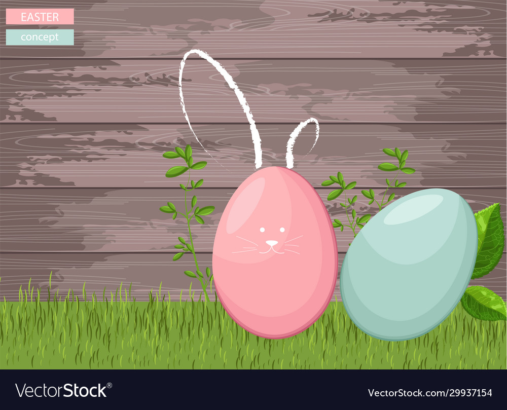 Happy easter colorful eggs on grass with wooden
