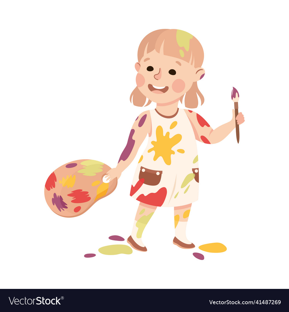 Little girl smeared in paints holding artist