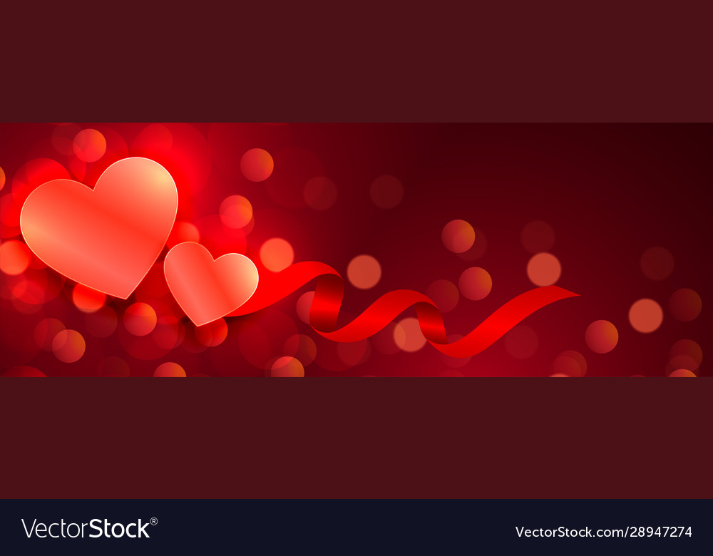 Beautiful hearts glowing red bokeh banner design