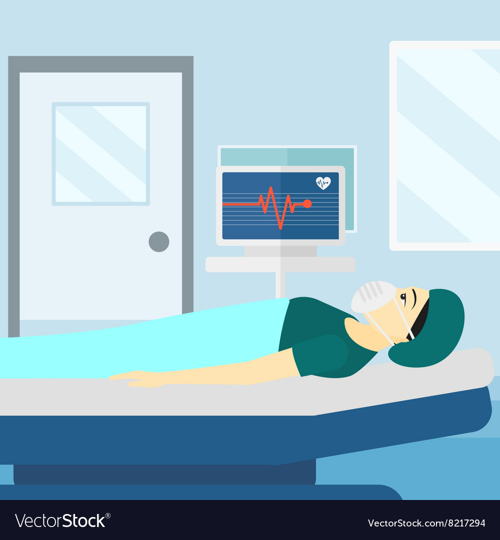 Patient lying in hospital bed with heart monitor