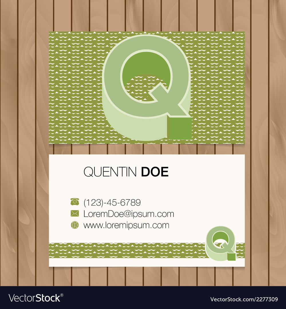 Business card with alphabet letter on a wood