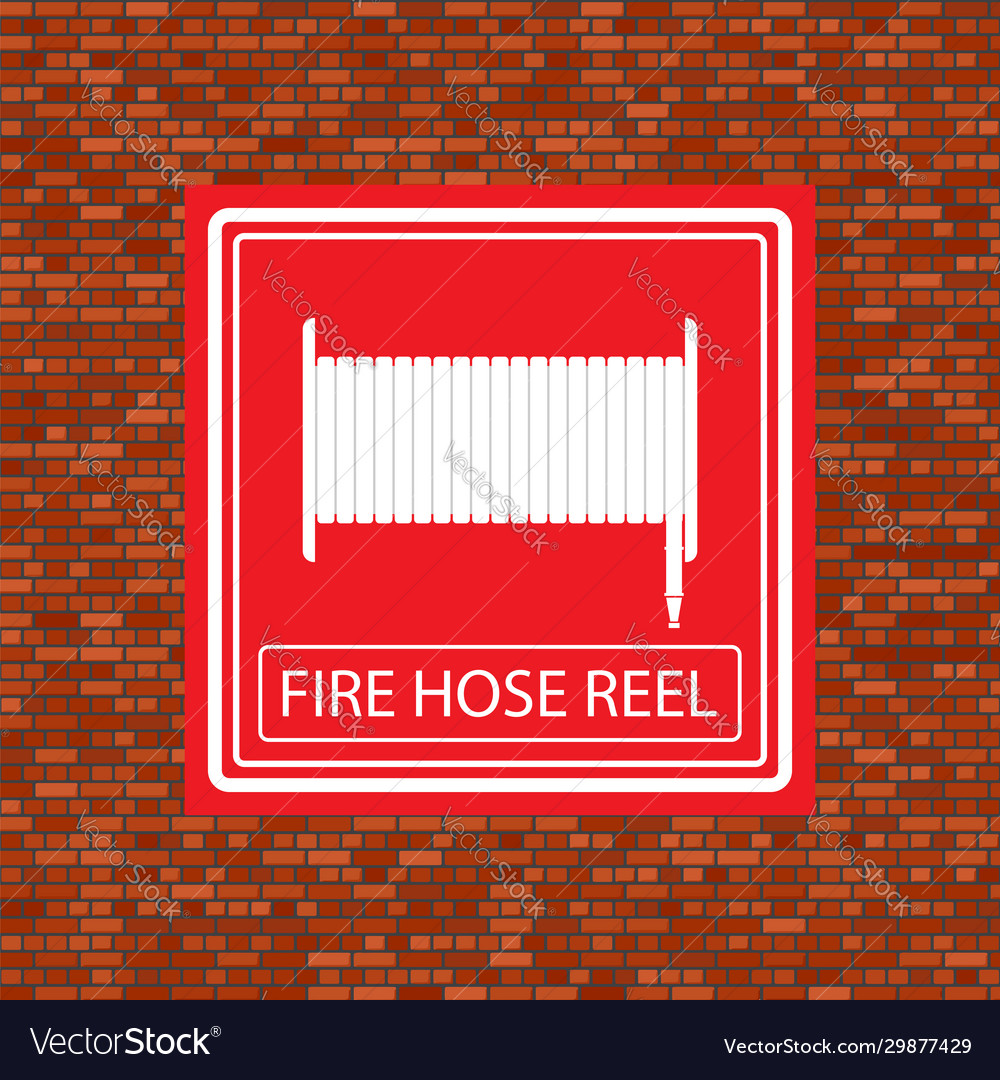 Fire hose reel icon on orange brick wall