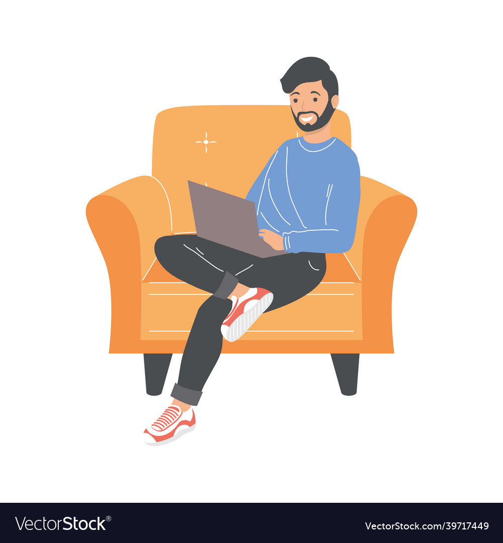 Man using laptop in sofa