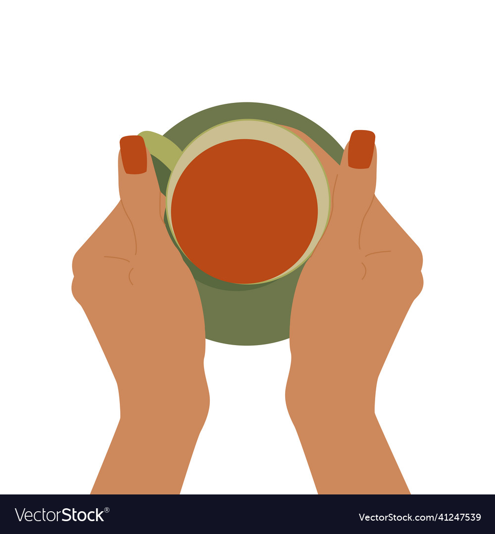 Top view hands hold a hot mug of tea