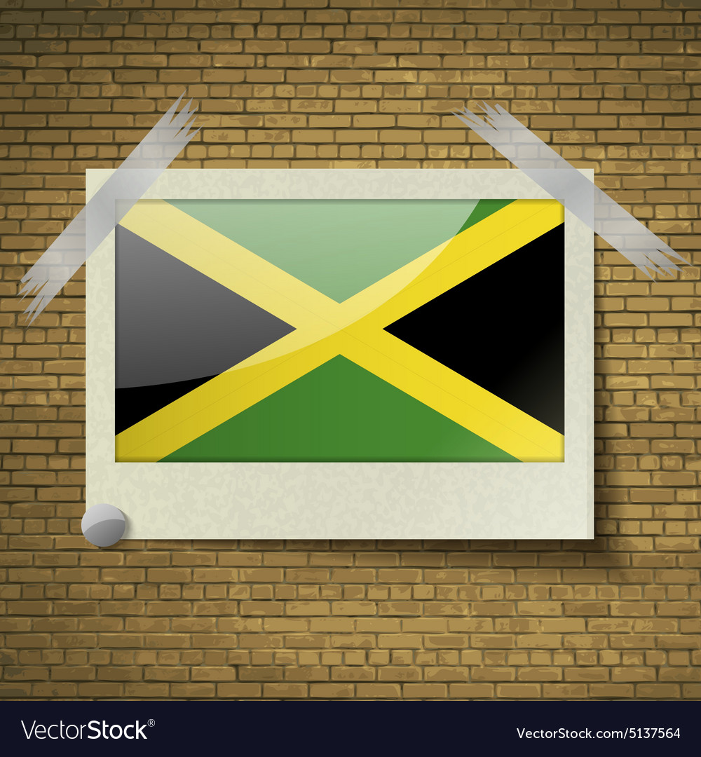 Flags Jamaica At Frame On A Brick Background
