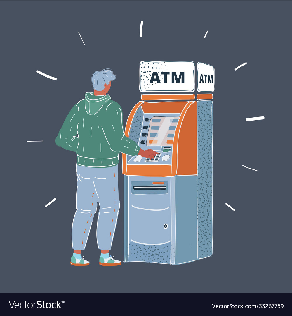 Man Using ATM Machine at Night