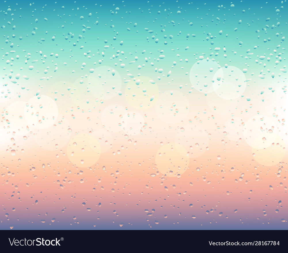 Raindrops on a blurred window with bokeh
