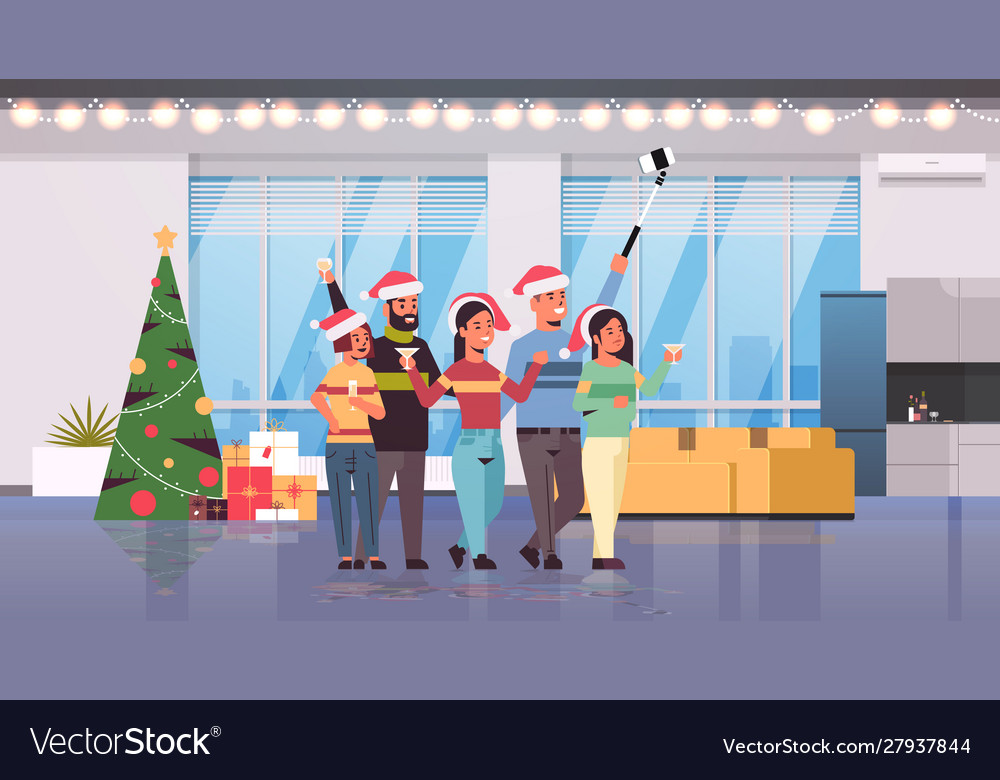 Friends celebrating christmas party taking selfie Vector Image