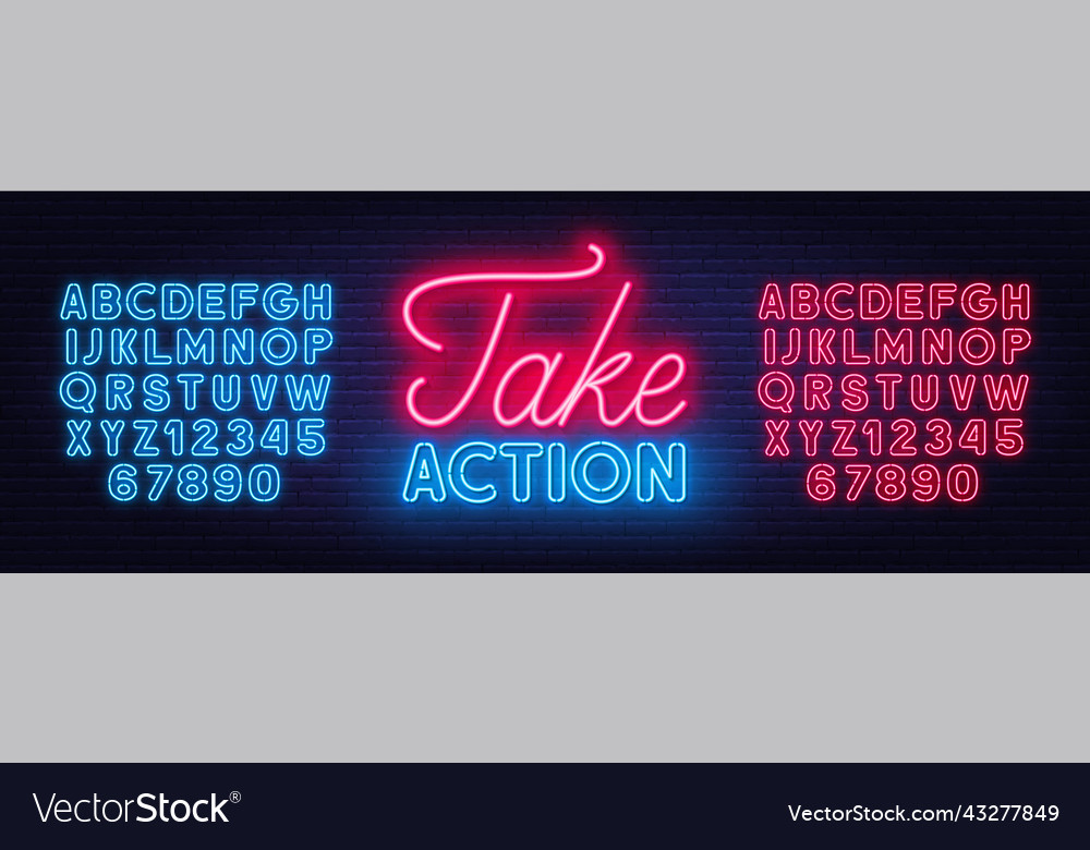 Take action neon quote on a brick wall