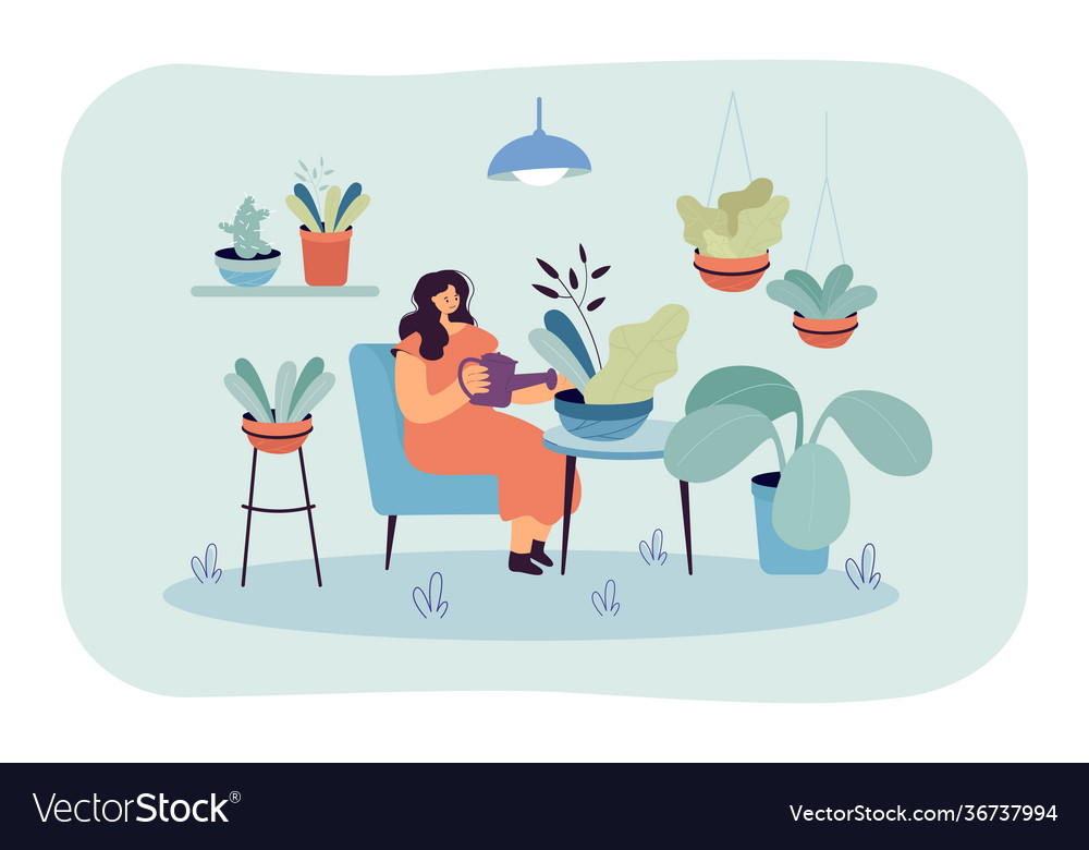 Happy relaxed woman taking care about houseplants