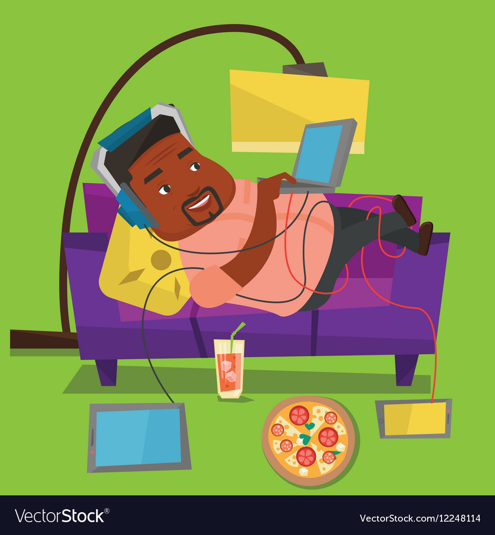 Man lying on sofa with many gadgets