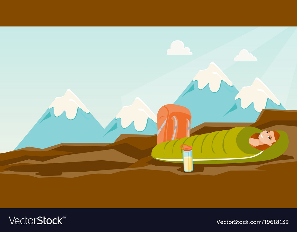 Woman sleeping in a bag the mountains