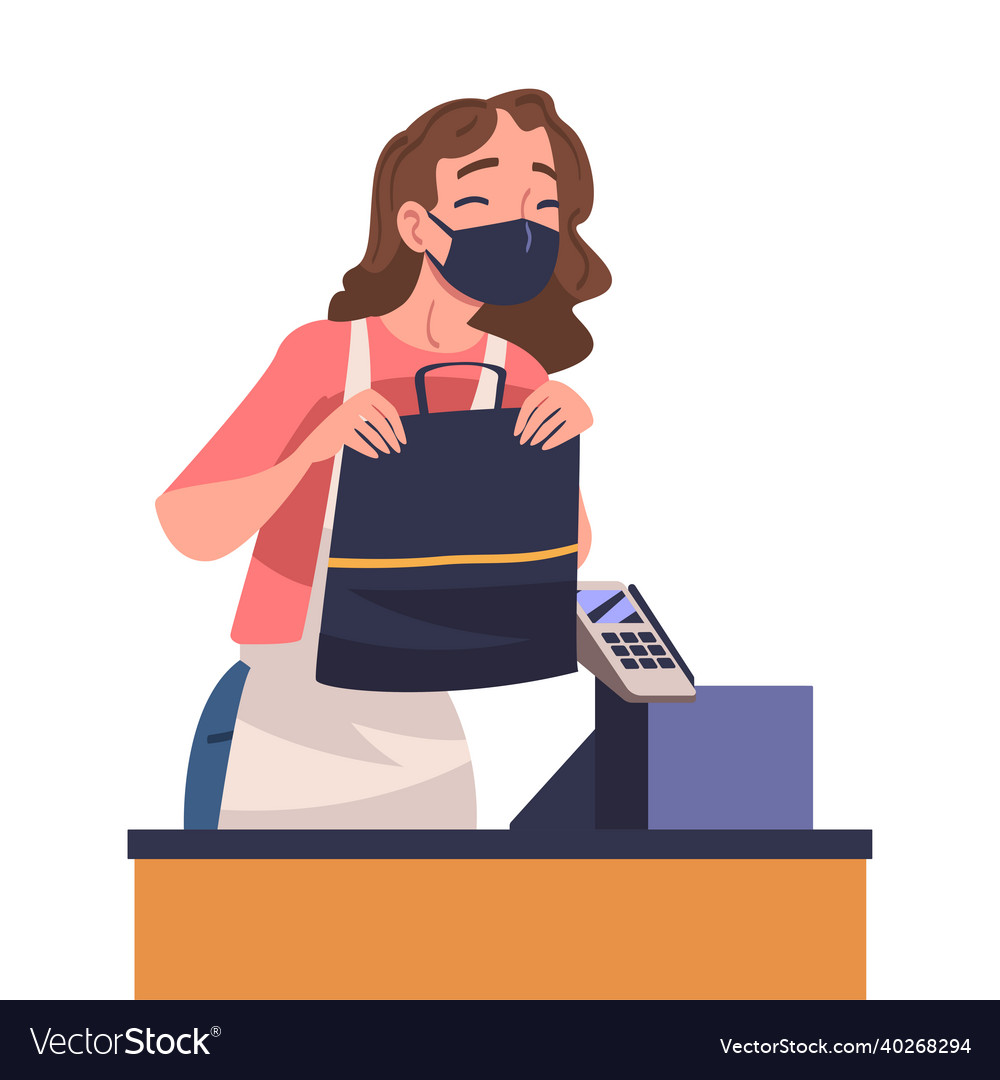 Woman cashier at supermarket or grocery store