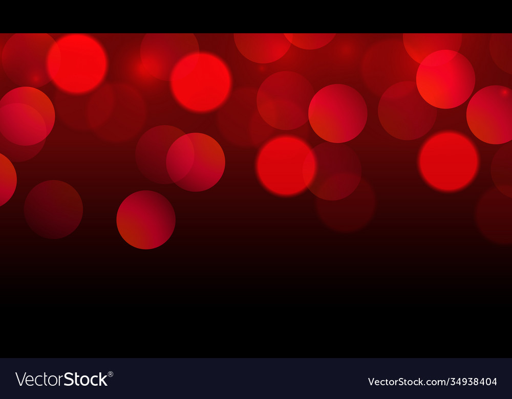 Multicolored blurry bokeh on a red background