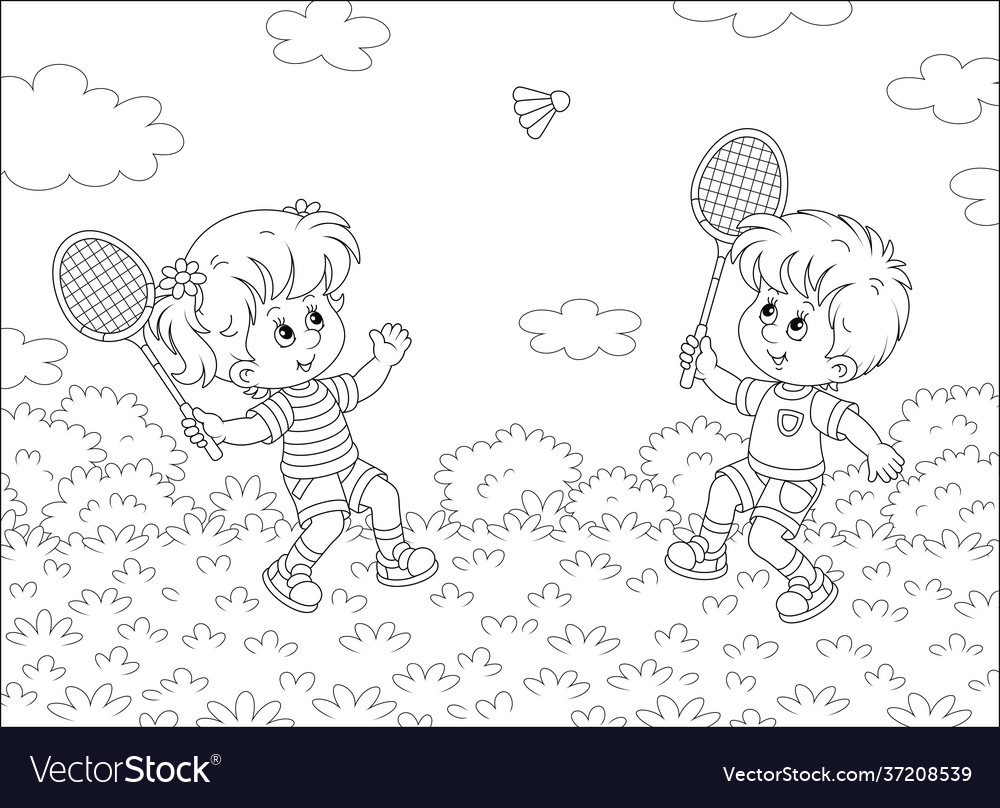 Happy little kids playing badminton