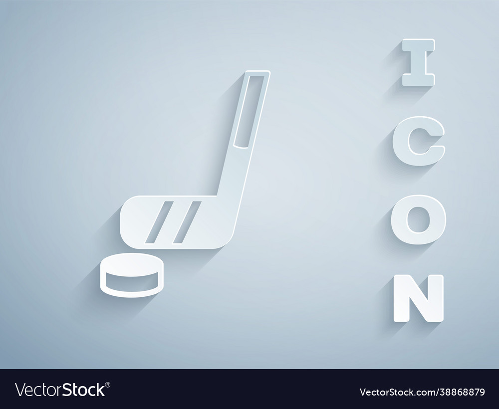 Paper cut ice hockey stick and puck icon isolated