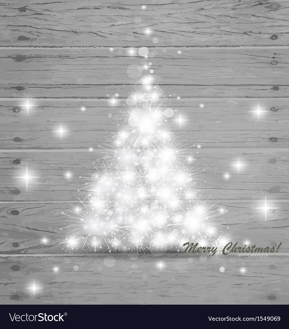 Christmas tree on wood background