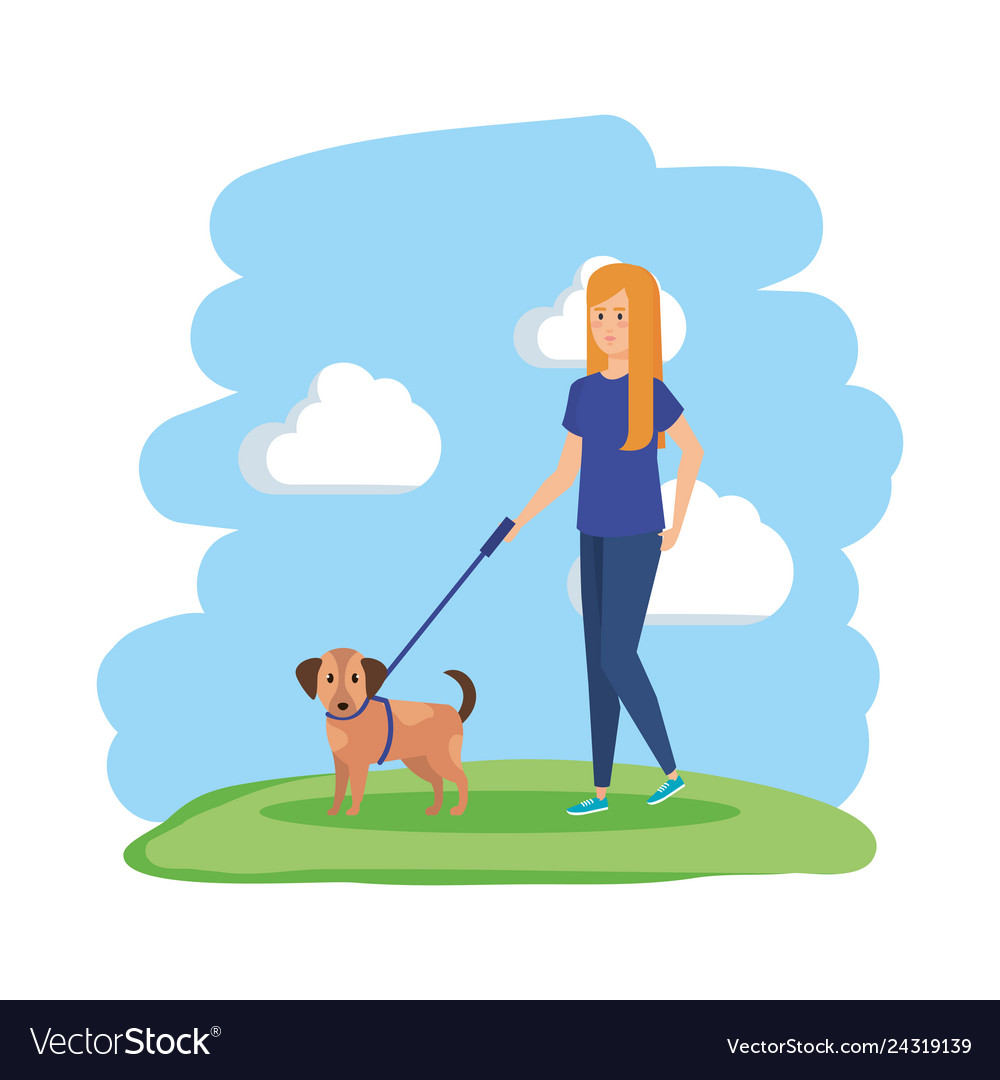 Young woman walking with dog